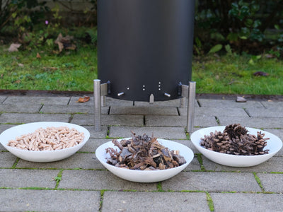 Pyrolysekocher zum Kochen und Herstellung von Pflanzenkohle im Garten